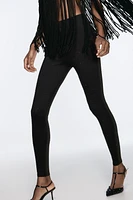 Leggings with a high elastic waist. Shiny bead appliqués.