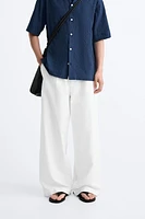 PLEATED WIDE FIT PANTS