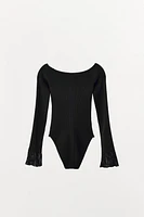 RUFFLED RIB BODYSUIT