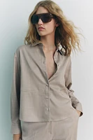 FLOWY SHIRT WITH PRONOUNCED TOPSTITCHING