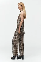 ZARA WOMAN COLLECTION<br/><br/>Pants made of 100% viscose.Mid-rise elastic waistband. Straight leg.