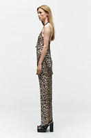 ZARA WOMAN COLLECTION<br/><br/>Pants made of 100% viscose.Mid-rise elastic waistband. Straight leg.