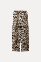 ZARA WOMAN COLLECTION<br/><br/>Pants made of 100% viscose.Mid-rise elastic waistband. Straight leg.