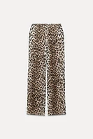 ZARA WOMAN COLLECTION<br/><br/>Pants made of 100% viscose.Mid-rise elastic waistband. Straight leg.