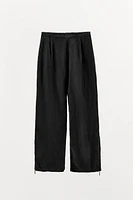 WIDE LEG ZIPPER PANTS