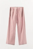 STRIPED PANTS WITH CONTRASTING PIPING