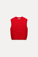 SOFT TOUCH CABLE KNIT VEST