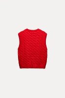 SOFT TOUCH CABLE KNIT VEST