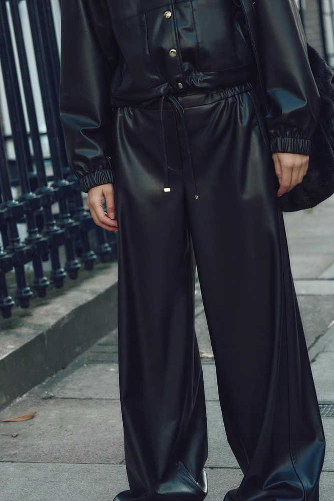 FAUX LEATHER WIDE LEG PANTS