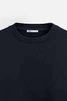 CONTRASTING HEM SWEATSHIRT