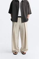 PLEATED WIDE FIT PANTS