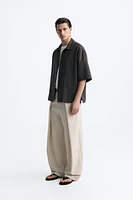 PLEATED WIDE FIT PANTS