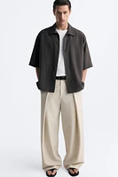 PLEATED WIDE FIT PANTS