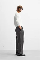 PLEATED CHINO PANTS