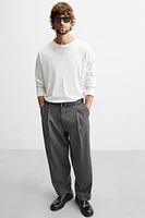 PLEATED CHINO PANTS