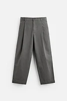 PLEATED CHINO PANTS