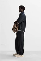 PLEATED JOGGING PANTS