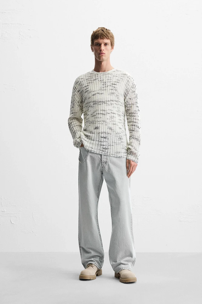 UNEVEN JACQUARD SWEATER