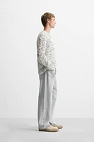 UNEVEN JACQUARD SWEATER