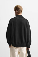 QUARTER ZIP SWEATER