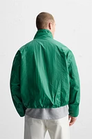 WAXED EFFECT TECHNICAL JACKET