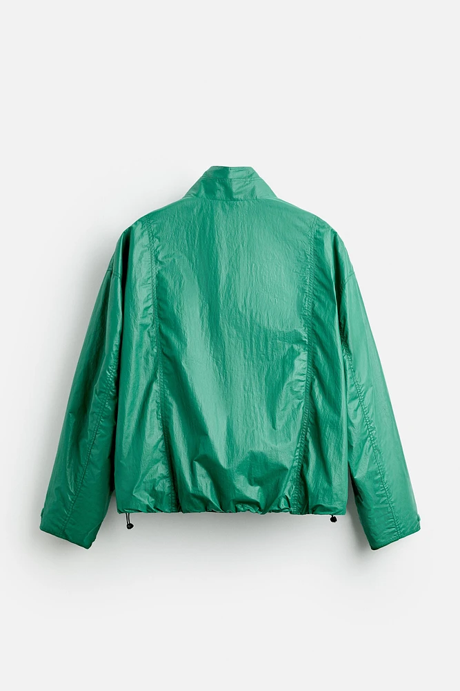 WAXED EFFECT TECHNICAL JACKET