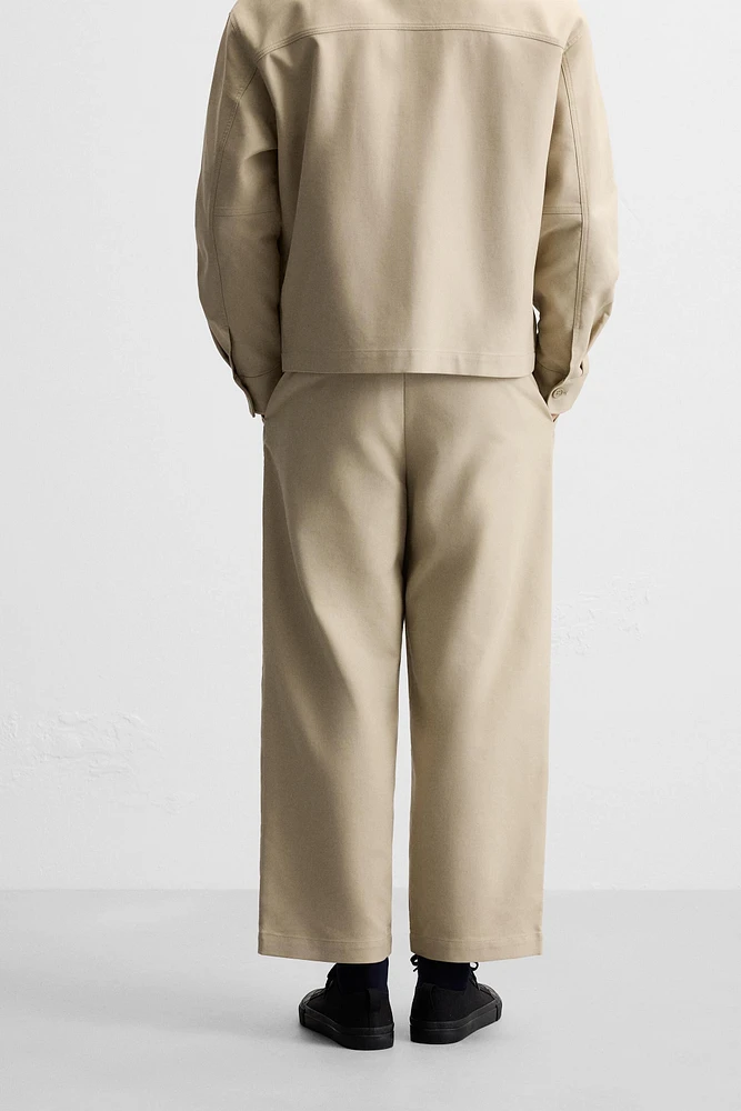 PLEATED STRAIGHT FIT PANTS