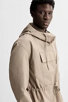 WATER REPELLENT TECHNICAL JACKET WITH POUCH POCKET