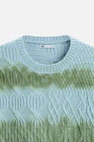 CABLE KNIT SPRAY PRINT SWEATER