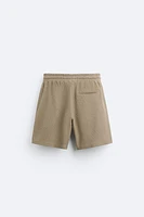 TEXTURED WEAVE SHORTS WITH MESH