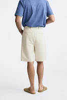 PLEATED WIDE FIT SHORTS