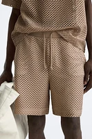 OPEN STRUCTURED SHORTS