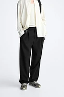 PLEATED WIDE FIT PANTS