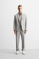 TEXTURED SUIT PANTS