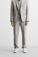 TEXTURED SUIT PANTS