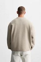 RAISED JACQUARD SWEATSHIRT