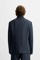 DOUBLE BREASTED HERRINGBONE SUIT JACKET