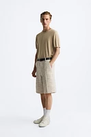 TEXTURED WEAVE RUFFLED SHORTS