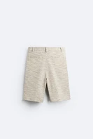 TEXTURED WEAVE RUFFLED SHORTS