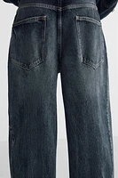 RELAXED FIT PLEATED JEANS