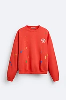 SPLATTER EFFECT TEXT SWEATSHIRT