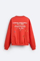 SPLATTER EFFECT TEXT SWEATSHIRT