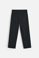 PLEATED CHINO PANTS