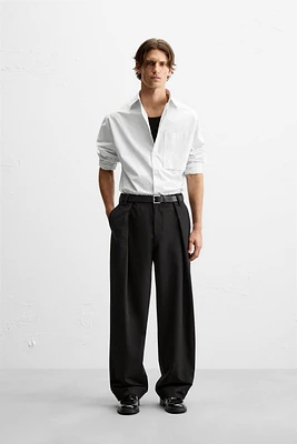 OVERSIZE FIT PLEATED PANTS