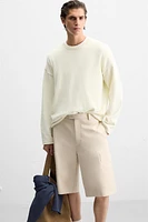 SWEATER WITH RAISED HEM