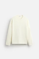 SWEATER WITH RAISED HEM