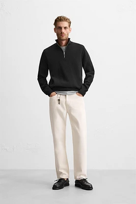 QUARTER ZIP SWEATER