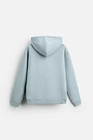 TEXTURED HOODED SWEATSHIRT