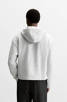 TEXTURED HOODED SWEATSHIRT