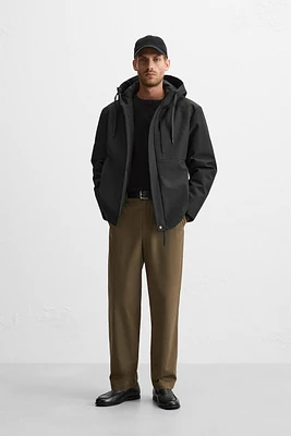 HOODED TECHNICAL JACKET